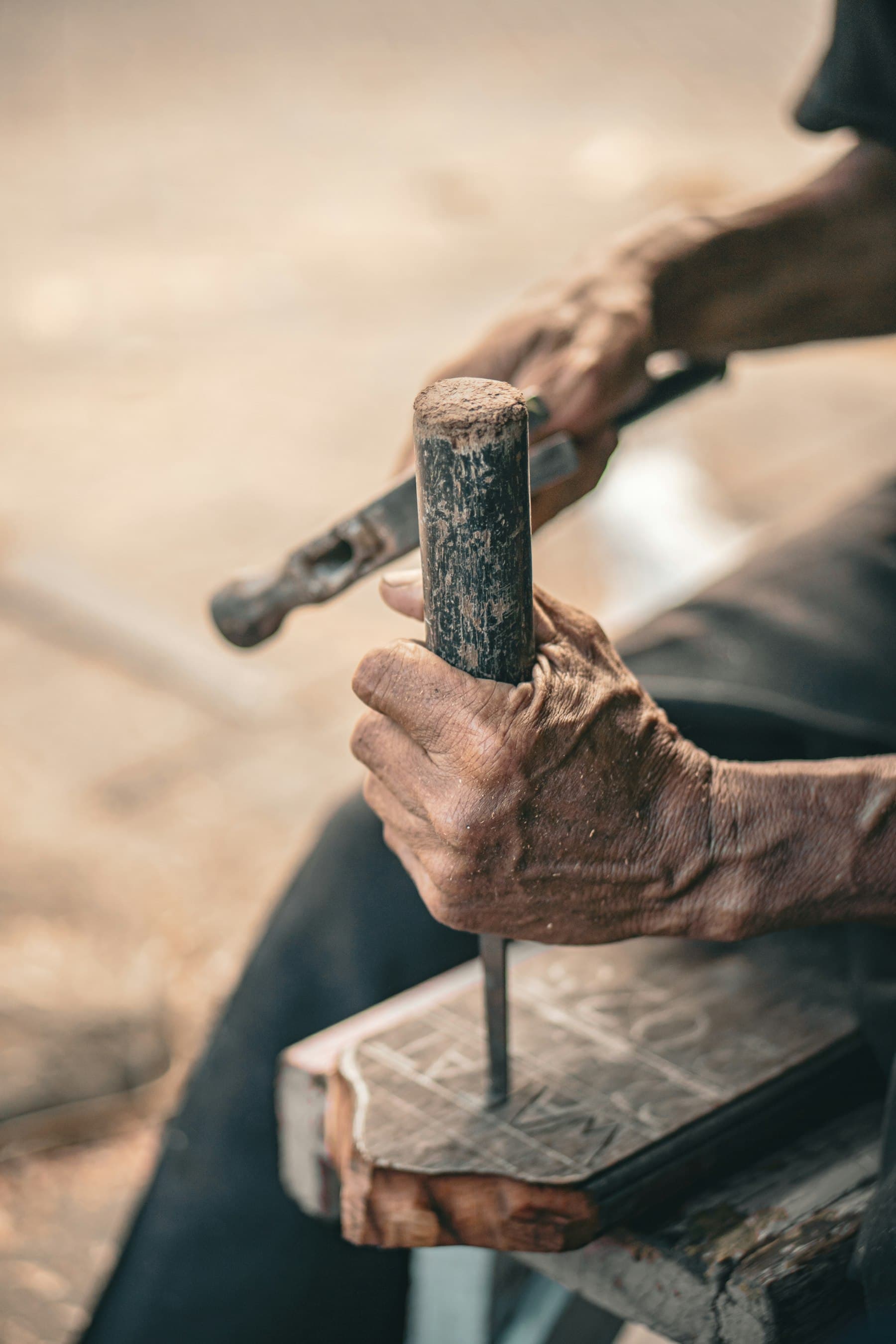 Hands measuring and marking on a job site